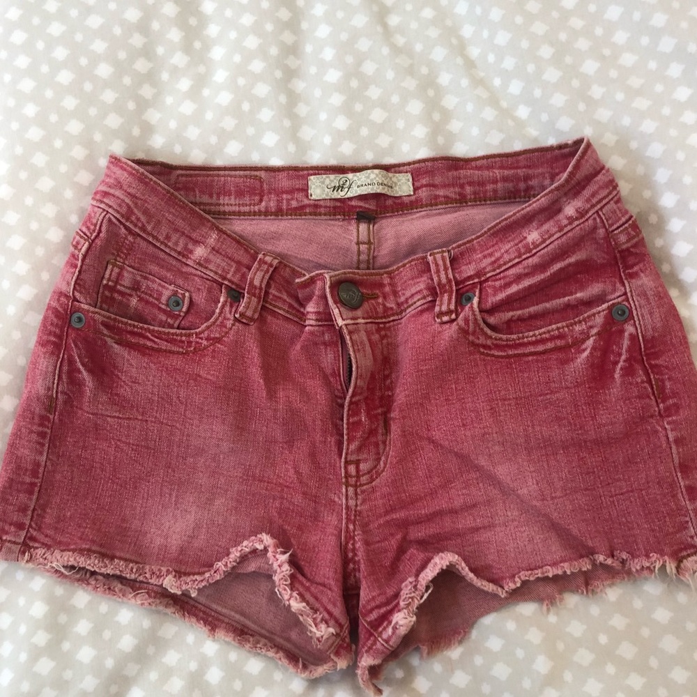 Red cutoff jean shorts